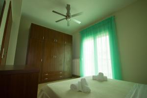 Postel nebo postele na pokoji v ubytování Stasa Luxury Apartments