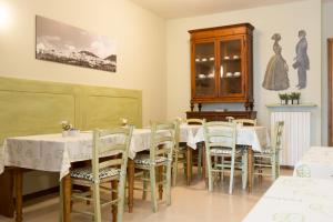 Reštaurácia alebo iné gastronomické zariadenie v ubytovaní Panorama d'Incanto