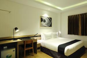 Katil atau katil-katil dalam bilik di K.C Hotel