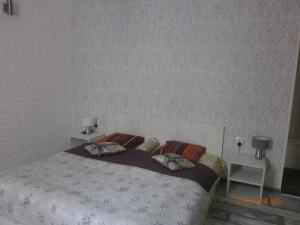Postel nebo postele na pokoji v ubytování Mini Hotel na Gasheka