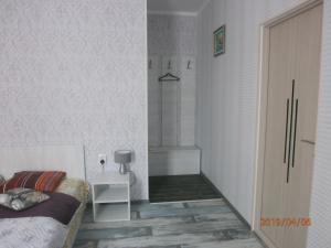 Postel nebo postele na pokoji v ubytování Mini Hotel na Gasheka