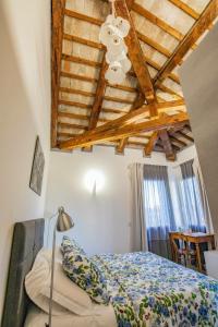 Postel nebo postele na pokoji v ubytování A casa di V-Ale