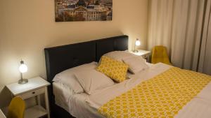 Uma cama ou camas num quarto em Hotel Bobbio