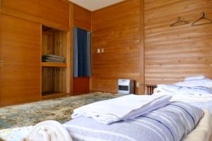 Cama o camas de una habitación en FWA Guest House