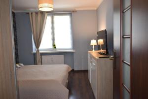 Fotografia z galérie ubytovania Pałacowa Condominium v destinácii Białystok