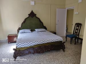 Posteľ alebo postele v izbe v ubytovaní Leela's Cottage