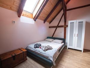 A bed or beds in a room at Penzion Na barokní cestě Wellness & Spa