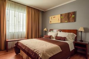 Postel nebo postele na pokoji v ubytování Hotel Libertador