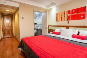 Postel nebo postele na pokoji v ubytování Hotel Libertador