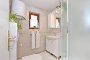 Kúpeľňa v ubytovaní Apartments Romansa