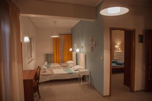 Postel nebo postele na pokoji v ubytování Hotel Liberty