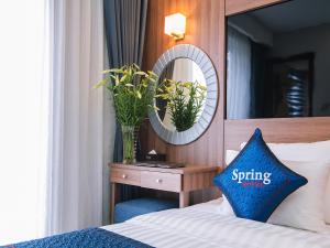 En eller flere senger på et rom på Spring Hotel Hanoi