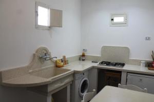 Kuchnia lub aneks kuchenny w obiekcie Appartamento in centro storico zona Gallipoli
