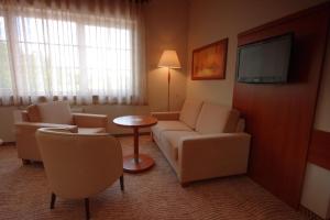 TV a/nebo společenská místnost v ubytování Hotel Sahara