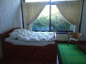מיטה או מיטות בחדר ב-Casa Aline