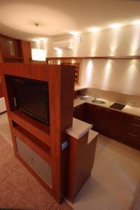 Postel nebo postele na pokoji v ubytování Hotel Sahara