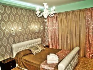 Кровать или кровати в номере Maranton Beach Hotel