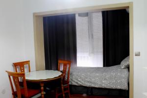 Cama o camas de una habitación en Fuengirolasun