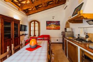 Kuchyň nebo kuchyňský kout v ubytování Casa Conti di Sotto
