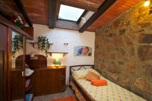 Postel nebo postele na pokoji v ubytování Casa Conti di Sotto
