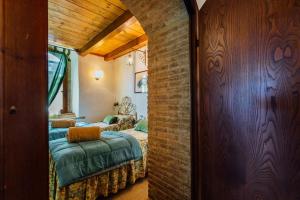 Postel nebo postele na pokoji v ubytování Casa Conti di Sotto