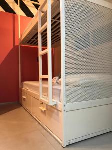 Cama ou camas em um quarto em Artsy Vitoria Hostel