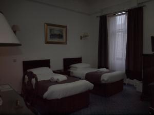 Krevet ili kreveti u jedinici u okviru objekta Argyll Arms Hotel