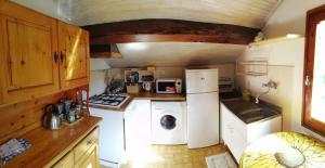 a kitchen with a refrigerator and a washer and dryer at DELIZIOSO ATTICO CON AMPIO TERRAZZO e GARAGE A DUE PASSI DAL MARE e DALLE CINQUETERRE LT-0485 in Levanto +46 photos
