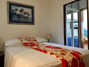 Postel nebo postele na pokoji v ubytování Villa deluxe near to the beach