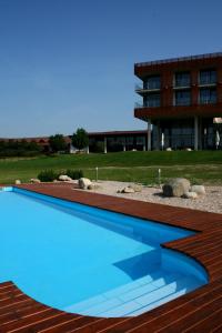 The swimming pool at or close to K-Triumf Resort