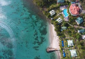 an aerial view of a beach with a resort at Calabash Cove Resort and Spa - Adults Only in Gros Islet