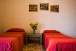Postel nebo postele na pokoji v ubytování Hotel Kennedy