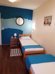Posteľ alebo postele v izbe v ubytovaní Favela Hostel
