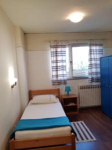 Posteľ alebo postele v izbe v ubytovaní Favela Hostel