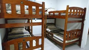 a couple of bunk beds in a room at Guotai Backpack in Kaohsiung