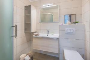 Koupelna v ubytování Apartment Dora
