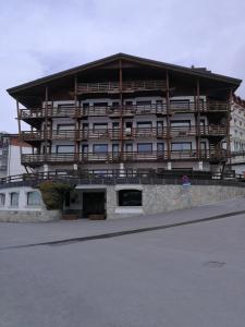 a large building with a lot of balconies on it at Condominio Royal ristrutturato in Sestriere