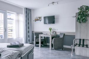 TV a/nebo společenská místnost v ubytování BnB 't Kraaiennest