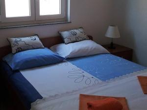 Postel nebo postele na pokoji v ubytování Apartment Fanny