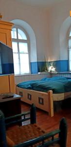 Postel nebo postele na pokoji v ubytování Apartments in Villa Crusca