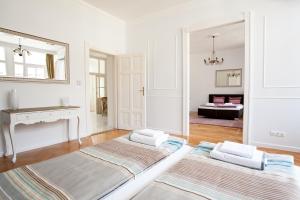 Posteľ alebo postele v izbe v ubytovaní Chic & Charm Apartment