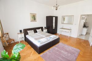 Posteľ alebo postele v izbe v ubytovaní Chic & Charm Apartment