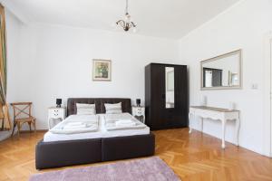 Posteľ alebo postele v izbe v ubytovaní Chic & Charm Apartment