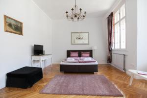 Posteľ alebo postele v izbe v ubytovaní Chic & Charm Apartment