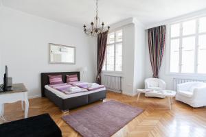 Posteľ alebo postele v izbe v ubytovaní Chic & Charm Apartment