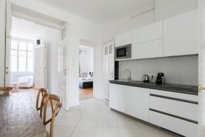 Kuchyňa alebo kuchynka v ubytovaní Chic & Charm Apartment