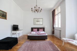 Posteľ alebo postele v izbe v ubytovaní Chic & Charm Apartment