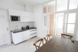 Kuchyňa alebo kuchynka v ubytovaní Chic & Charm Apartment