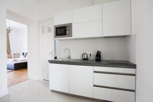 Kuchyňa alebo kuchynka v ubytovaní Chic & Charm Apartment