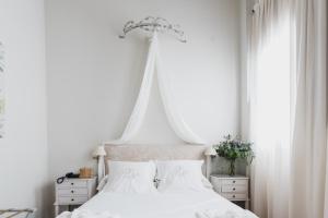 A bed or beds in a room at Palacio De Los Navas